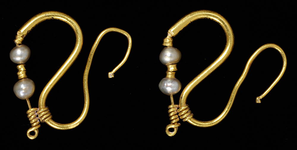 A pair of early Roman natural pearl and gold earrings - previously on display at the Victoria and Albert Museum, UK